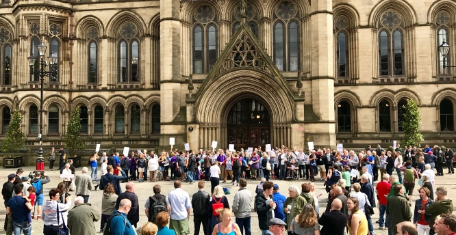 Singing together in Albert Square